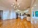 Bright kitchen with stainless appliances, granite counters and large center island at 6765 Crofton Dr, Alpharetta, GA 30005