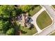 Bird's eye view of a well-maintained property with a circular driveway and mature landscaping at 9742 Fallview Ct, Villa Rica, GA 30180