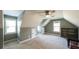 Finished attic space with ample natural light, built-in storage, and plenty of room for activities at 9742 Fallview Ct, Villa Rica, GA 30180