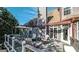Outdoor patio with comfortable seating under a pergola with views to the yard and beyond at 9742 Fallview Ct, Villa Rica, GA 30180