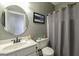 Well-lit bathroom with a shower/tub at 9742 Fallview Ct, Villa Rica, GA 30180
