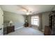 Comfortable bedroom featuring a large window and well-placed end tables with lamps for extra light at 9742 Fallview Ct, Villa Rica, GA 30180