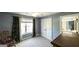 This bedroom has natural light from its windows and features a large closet for storage at 9742 Fallview Ct, Villa Rica, GA 30180