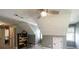 Angled ceilings and dormer windows make this room interesting with a ceiling fan and good natural light at 9742 Fallview Ct, Villa Rica, GA 30180