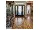 Hallway with hardwood floors and white molding at 9742 Fallview Ct, Villa Rica, GA 30180
