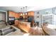 Bright eat-in kitchen with granite counters, an island with lighting, stainless appliances, and tile flooring at 9742 Fallview Ct, Villa Rica, GA 30180