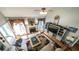 Bright living room with vaulted ceiling, fireplace, and staircase to the upper level at 9742 Fallview Ct, Villa Rica, GA 30180
