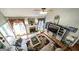 Bright living room featuring a fireplace, media center, and comfortable seating at 9742 Fallview Ct, Villa Rica, GA 30180