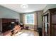 Home office with desk and built-in cabinets at 9742 Fallview Ct, Villa Rica, GA 30180