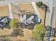 An aerial view of the home shows the driveway and mature trees on the grounds at 101 Lumby Ln, Stockbridge, GA 30281