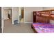 Spacious bedroom featuring a wooden bunk bed and neutral carpet at 101 Lumby Ln, Stockbridge, GA 30281