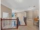 Hallway with staircase, chandelier, and neutral decor at 101 Lumby Ln, Stockbridge, GA 30281