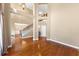 Open-concept living room with hardwood floors and staircase at 101 Lumby Ln, Stockbridge, GA 30281