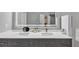 Modern bathroom with double vanity, quartz countertop, stylish fixtures, and bright, neutral decor at 101 Lumby Ln, Stockbridge, GA 30281