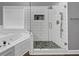 Glass-enclosed shower and soaking tub highlight this bathroom's modern design with sleek fixtures at 101 Lumby Ln, Stockbridge, GA 30281