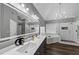 Bright bathroom with soaking tub, glass shower, and double vanity with ample counter space at 101 Lumby Ln, Stockbridge, GA 30281