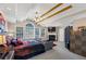 Spacious main bedroom featuring tray ceilings, fireplace, sitting area, and ensuite bathroom access at 101 Lumby Ln, Stockbridge, GA 30281