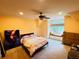 Bedroom features a comfortable window seat and a wall design creating an inviting place to unwind at 1023 Little Darby Ln, Suwanee, GA 30024