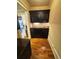 Butler's pantry featuring dark cabinets, a beverage cooler, and a sink at 1023 Little Darby Ln, Suwanee, GA 30024