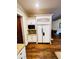 Elegant kitchen includes custom cabinets, microwave, and a built-in refrigerator at 1023 Little Darby Ln, Suwanee, GA 30024