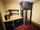 Kitchenette with a stainless steel refrigerator and dark wooden cabinets at 1023 Little Darby Ln, Suwanee, GA 30024