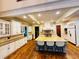 Gourmet kitchen with granite countertops, white cabinets, and stainless steel appliances at 1023 Little Darby Ln, Suwanee, GA 30024