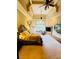 Spacious main bedroom with a fireplace, sitting area, high ceilings, and plenty of natural light at 1023 Little Darby Ln, Suwanee, GA 30024