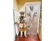 A life-sized replica of a Jawa and Han Solo frozen in carbonite stands tall in a themed room with stone accents at 1023 Little Darby Ln, Suwanee, GA 30024
