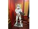 A life-sized replica of a Stormtrooper stands tall in a themed room with dark red accent walls and classic trim at 1023 Little Darby Ln, Suwanee, GA 30024