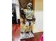 A life-sized replica of Boba Fett stands tall in a themed room with stone accents and dark hardwood floors at 1023 Little Darby Ln, Suwanee, GA 30024