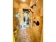 Tiled shower features a glass door, multiple shower heads, and a built-in shampoo niche at 1023 Little Darby Ln, Suwanee, GA 30024