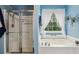 Bright bathroom featuring a soaking tub under a window and separate shower with glass door at 3388 Washington Cmns Nw Ave, Kennesaw, GA 30144