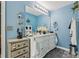 Bathroom with double sink vanity and many mirrors at 3388 Washington Cmns Nw Ave, Kennesaw, GA 30144