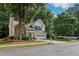 Charming home with brick facade, two-car garage, and beautifully landscaped front yard at 3388 Washington Cmns Nw Ave, Kennesaw, GA 30144