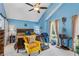 Main bedroom suite with blue walls, ceiling fan, and vaulted ceiling at 3388 Washington Cmns Nw Ave, Kennesaw, GA 30144