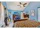 Main bedroom with ceiling fan and view of flat screen TV at 3388 Washington Cmns Nw Ave, Kennesaw, GA 30144