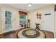 Cozy sitting area with area rug and door to outside at 3388 Washington Cmns Nw Ave, Kennesaw, GA 30144