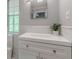 Contemporary bathroom featuring a sleek vanity and plenty of natural light at 379 Bohannon Rd, Grantville, GA 30220