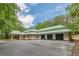 Side view of the house and driveway, including a three-car garage at 379 Bohannon Rd, Grantville, GA 30220