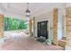 Inviting front porch with brick columns and decorative accents, leading to the front door at 379 Bohannon Rd, Grantville, GA 30220