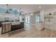 Bright open kitchen featuring stainless steel appliances, farmhouse sink, and access to the living room at 379 Bohannon Rd, Grantville, GA 30220