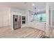 Well-lit kitchen with stainless steel appliances, including a large refrigerator and double ovens at 379 Bohannon Rd, Grantville, GA 30220