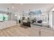 Gourmet kitchen open to living room featuring custom cabinets and appliances at 379 Bohannon Rd, Grantville, GA 30220