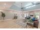 Open-concept living area with seamless transitions to dining and kitchen at 379 Bohannon Rd, Grantville, GA 30220