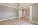 Bright, open living room with decorative columns and a sliding barn door at 379 Bohannon Rd, Grantville, GA 30220
