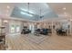 Bright open living space with hardwood floors, an adjacent kitchen, and backyard access at 379 Bohannon Rd, Grantville, GA 30220