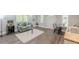 Inviting living area with hardwood floors, comfortable seating, and an abundance of natural light at 379 Bohannon Rd, Grantville, GA 30220