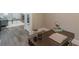 Office space featuring hardwood floors and view into the living space at 379 Bohannon Rd, Grantville, GA 30220
