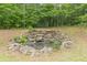 Charming backyard pond and rock feature at 379 Bohannon Rd, Grantville, GA 30220