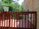 Wooden deck with railing, perfect for outdoor relaxation and entertaining at 5517 Rock Shoals Way, Atlanta, GA 30349